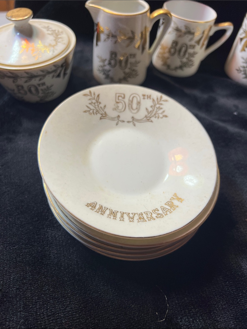 50th Anniversary White and Gold Porcelain Saucer Set